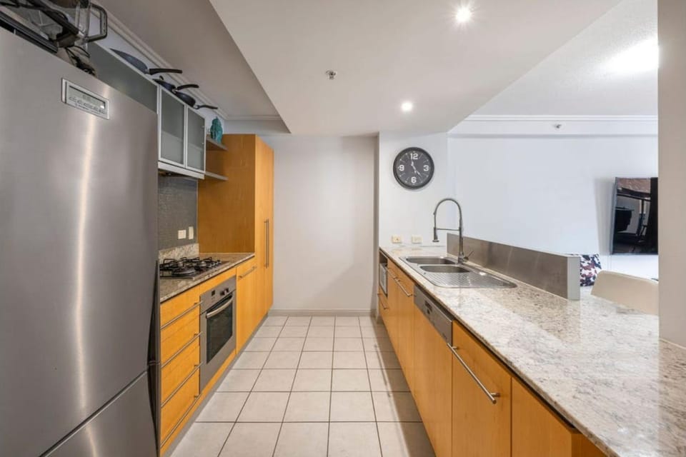 Kitchen or kitchenette, dishwasher, oven, stove
