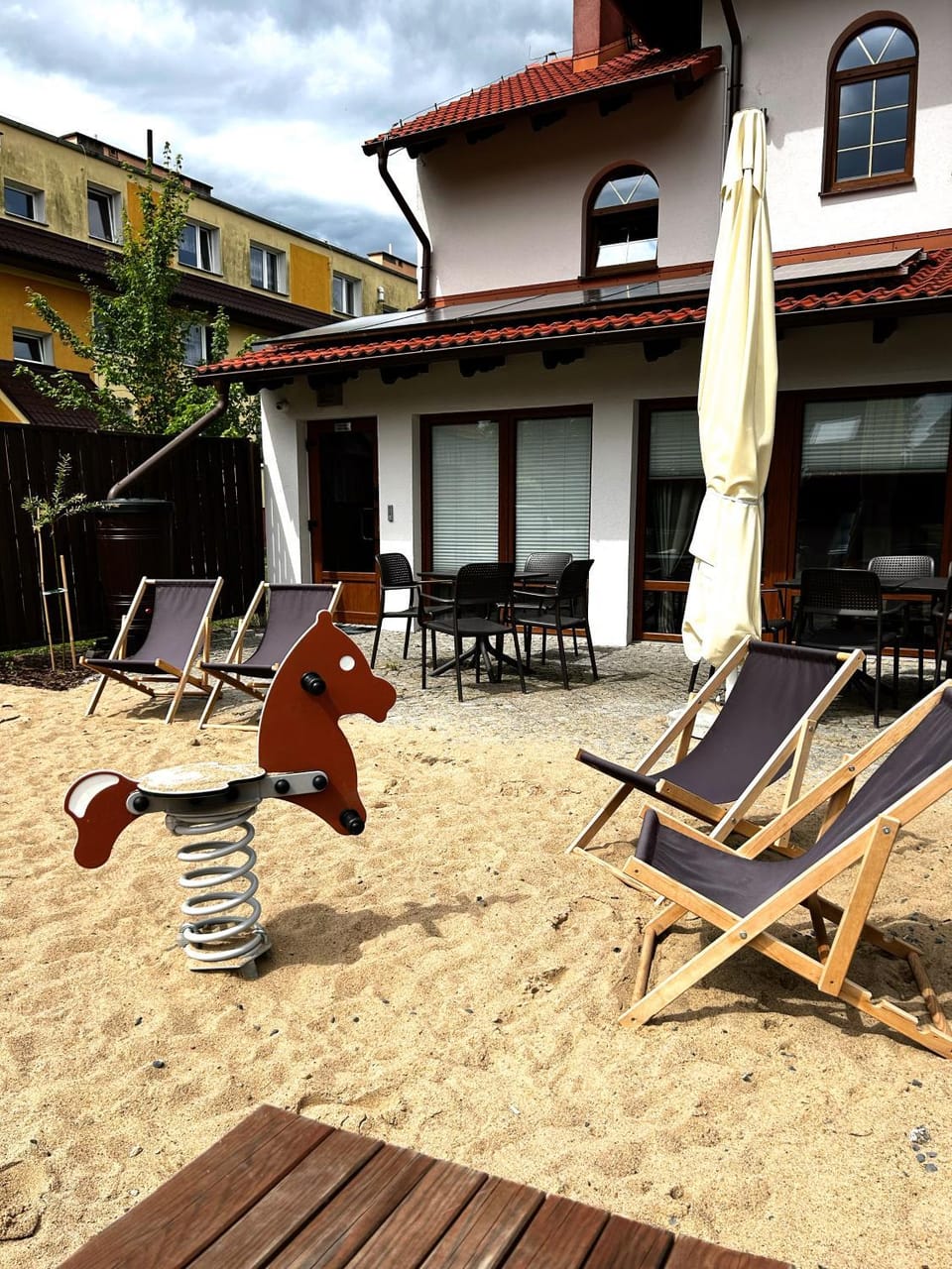 Property building, Patio, Day, Children play ground, sunbed