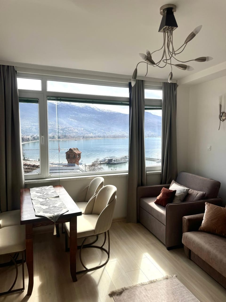 Natural landscape, Living room, Seating area, Dining area, Lake view, Mountain view