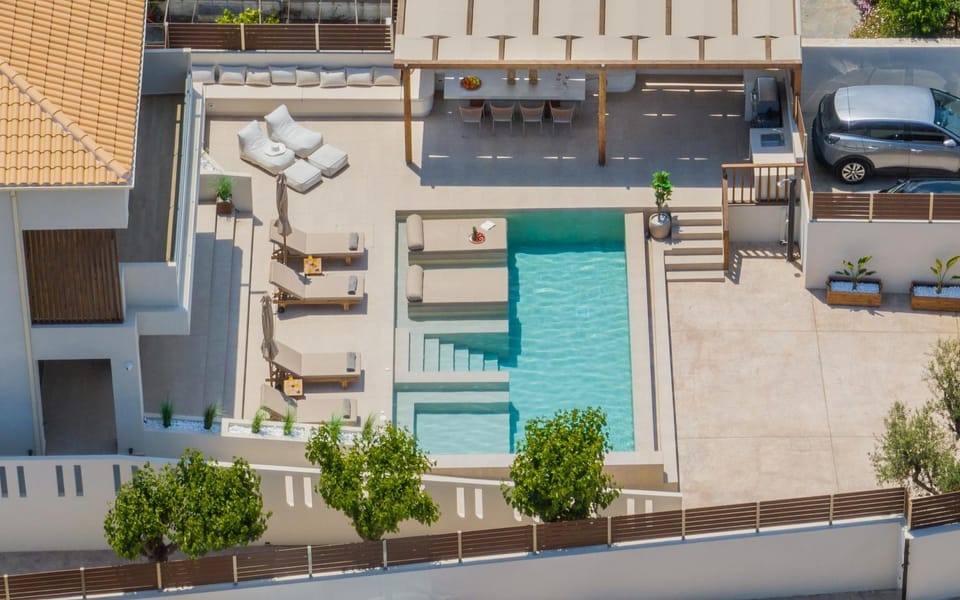 Property building, BBQ facilities, Seating area, Swimming pool