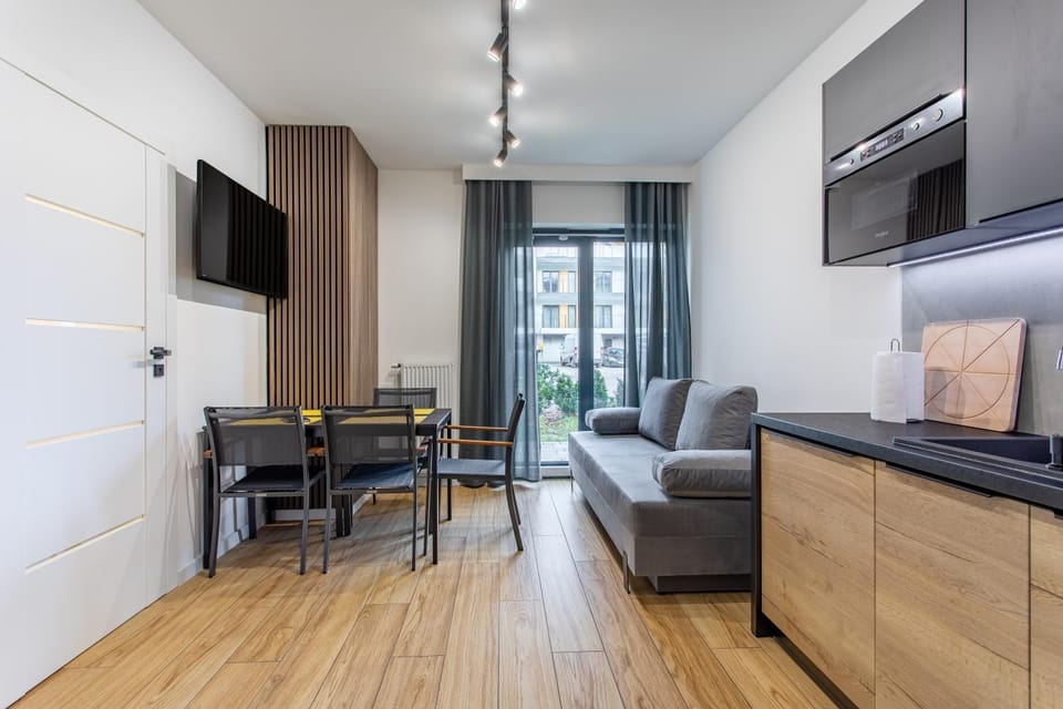 Kitchen or kitchenette, Living room, Seating area, Dining area