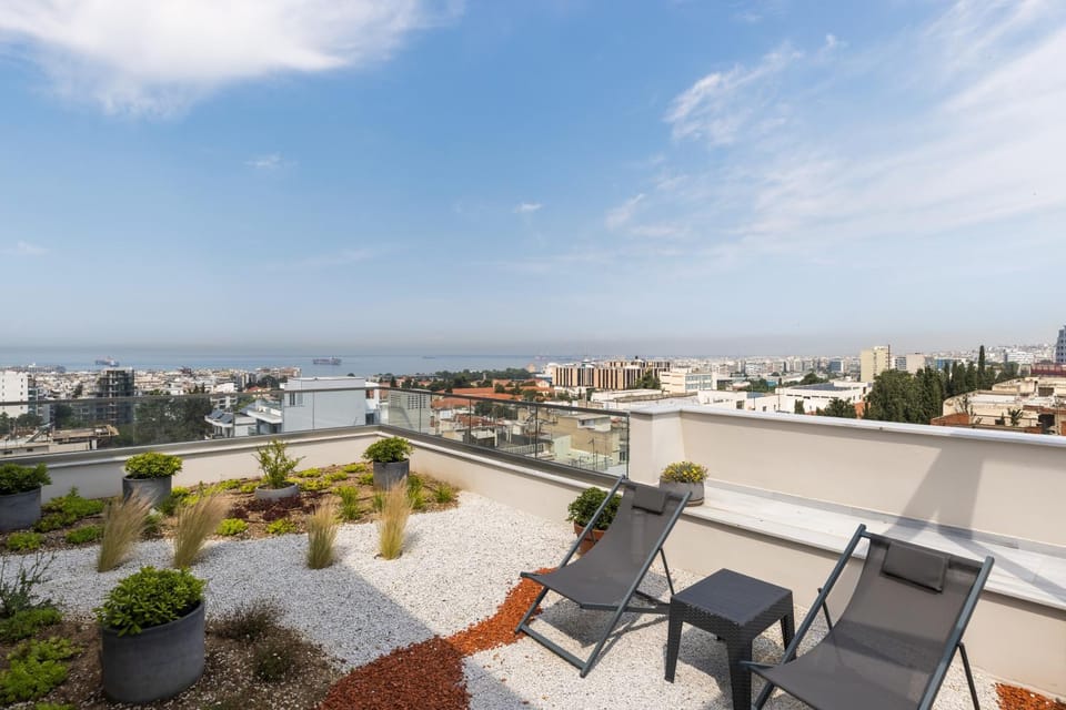 Property building, Patio, Natural landscape, View (from property/room), Balcony/Terrace, City view, Sea view