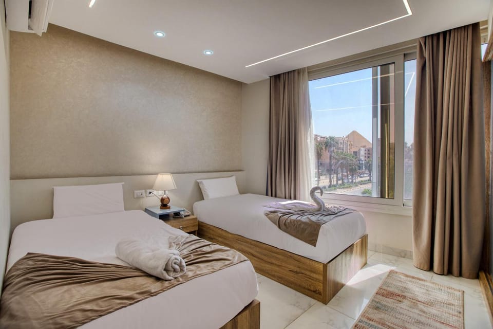 Bed, Living room, Photo of the whole room, Seating area, Bedroom, towels
