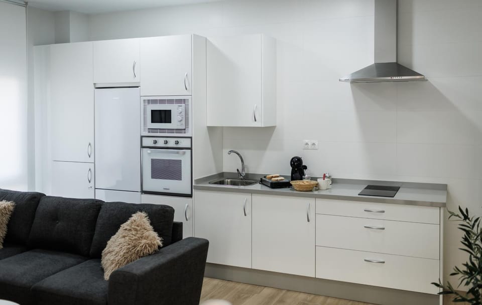 Kitchen or kitchenette, oven