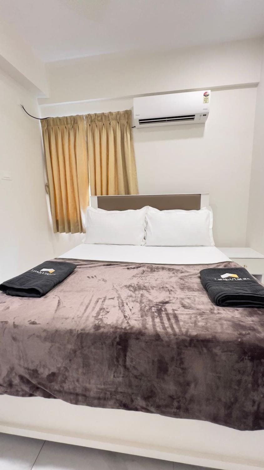 Bed, Photo of the whole room, Bedroom, towels, air conditioner