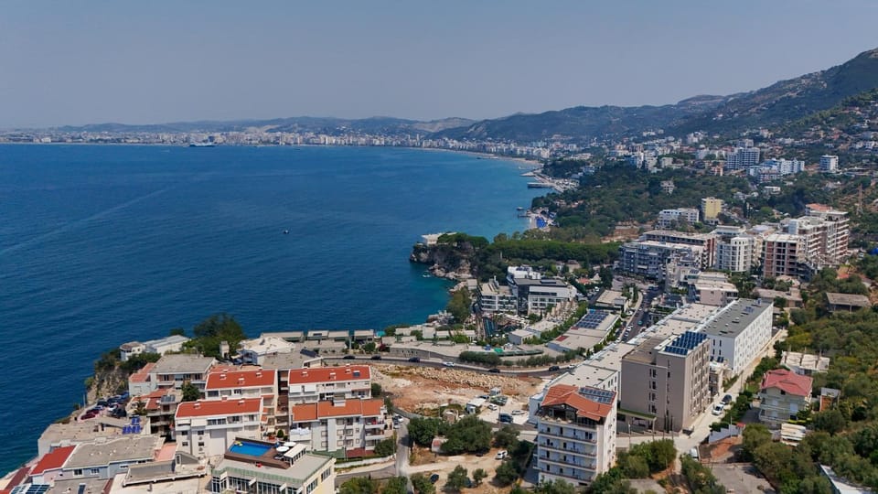 Nearby landmark, Day, Neighbourhood, Natural landscape, Beach, City view, Mountain view, Sea view, Street view, Location