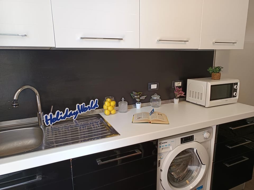 Kitchen or kitchenette, washing machine