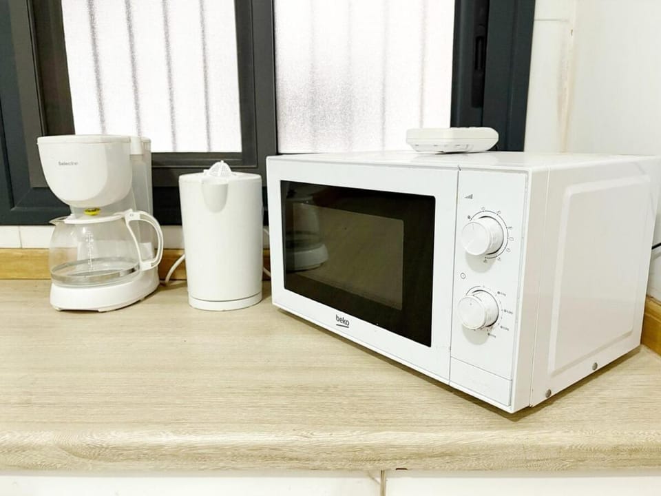 Kitchen or kitchenette, microwave