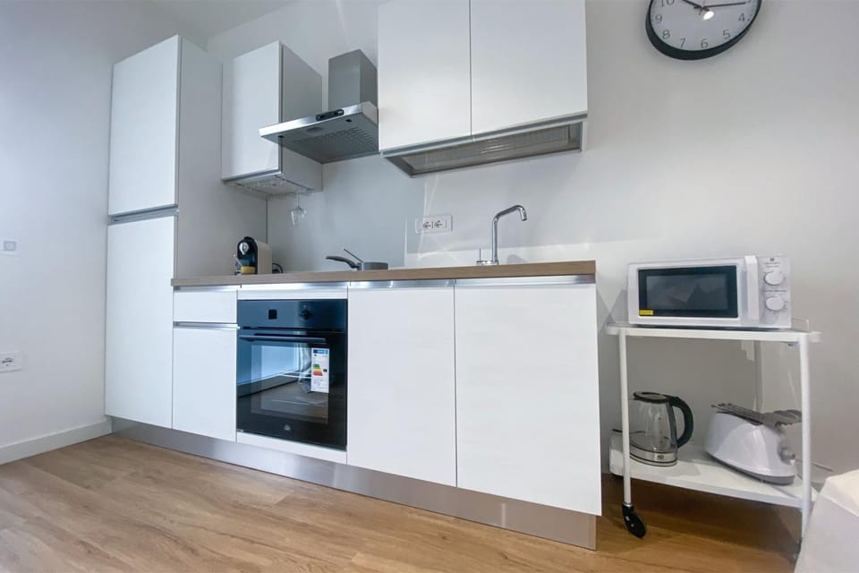Kitchen or kitchenette, oven, stove, toaster
