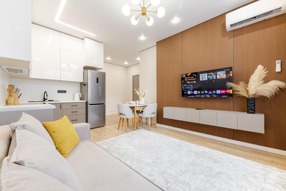 TV and multimedia, Kitchen or kitchenette, Living room, Seating area, Dining area, stove, air conditioner