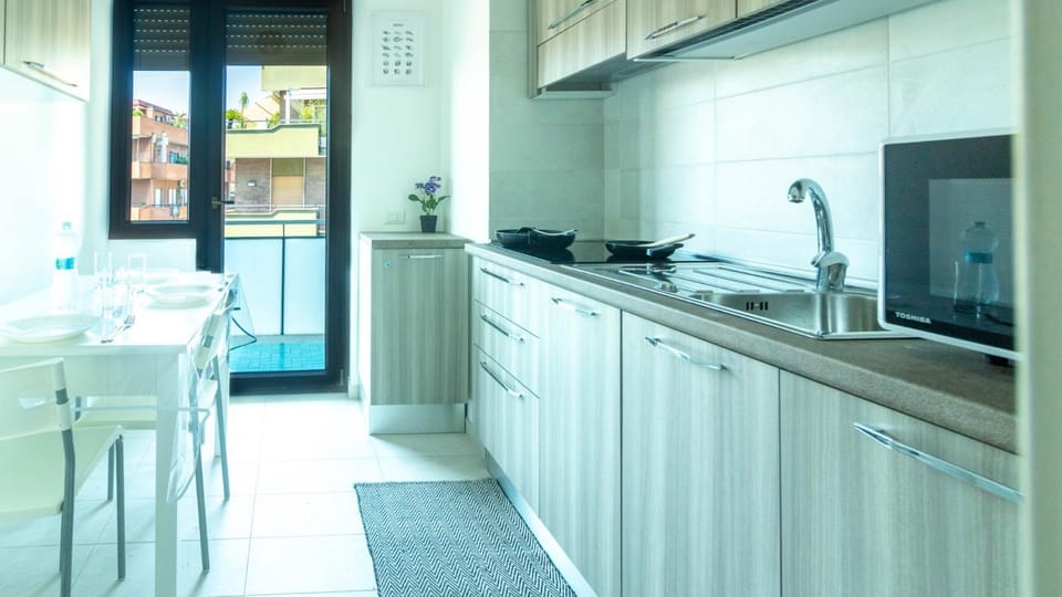Kitchen or kitchenette, Photo of the whole room, Dining area, dishwasher, microwave, laundry