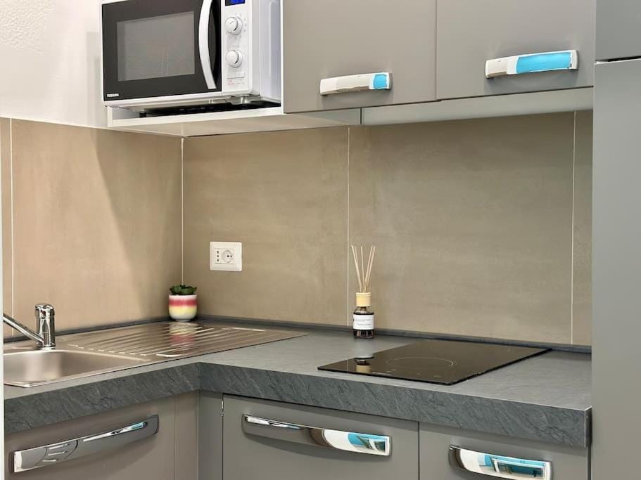 Kitchen or kitchenette, stove