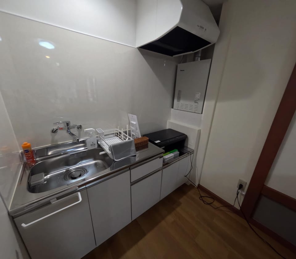 Kitchen or kitchenette, stove