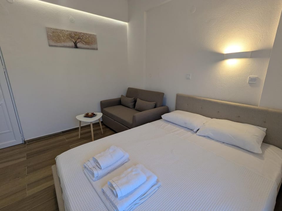 Bed, Living room, Seating area, Bedroom