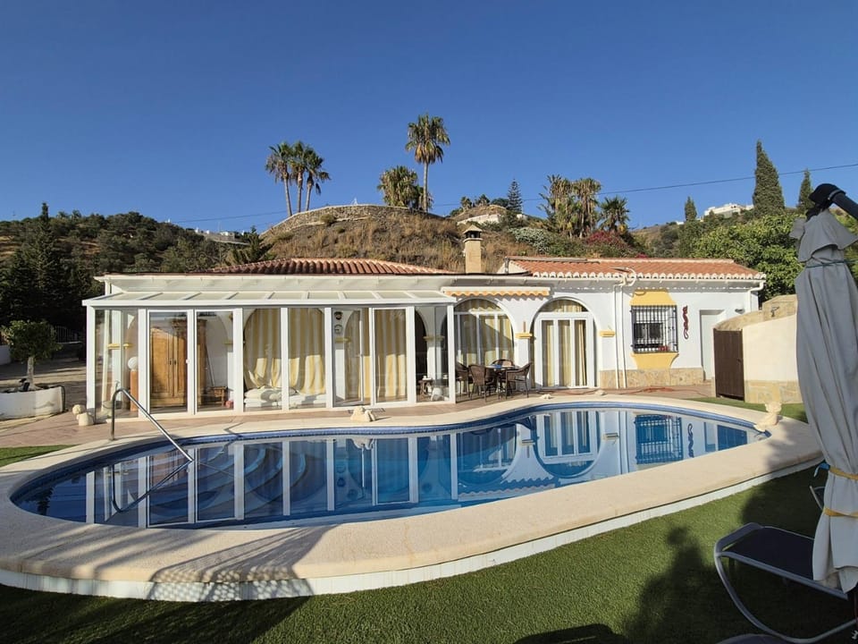Property building, Living room, Swimming pool