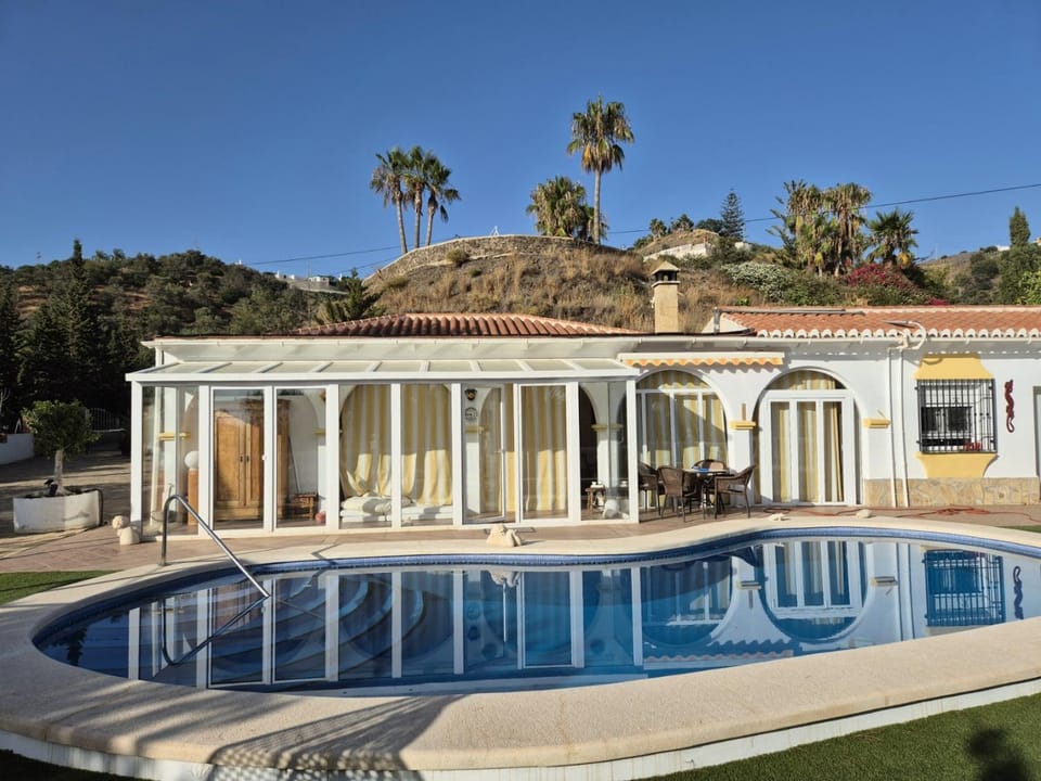 Property building, Living room, Swimming pool