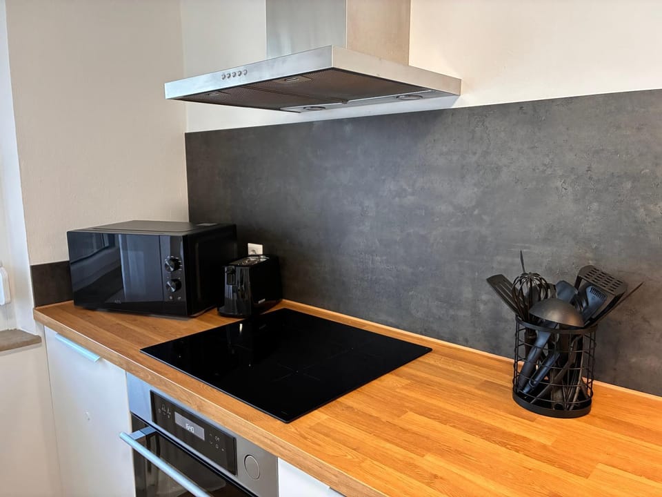 Kitchen or kitchenette, stove, toaster