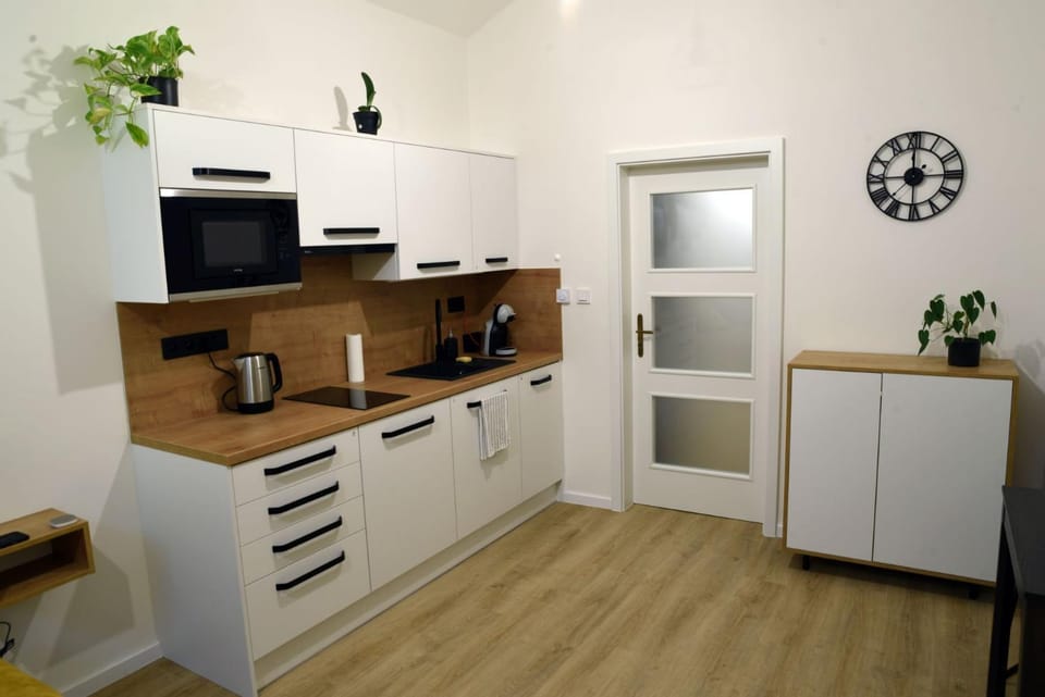 Kitchen or kitchenette, dishwasher, microwave, stove, kitchen