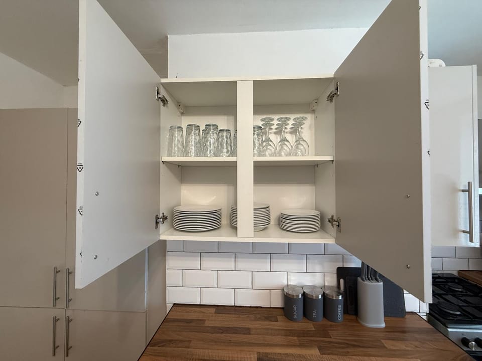 Kitchen or kitchenette, stove, toaster