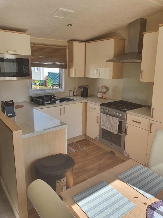 Kitchen or kitchenette, oven, stove, toaster