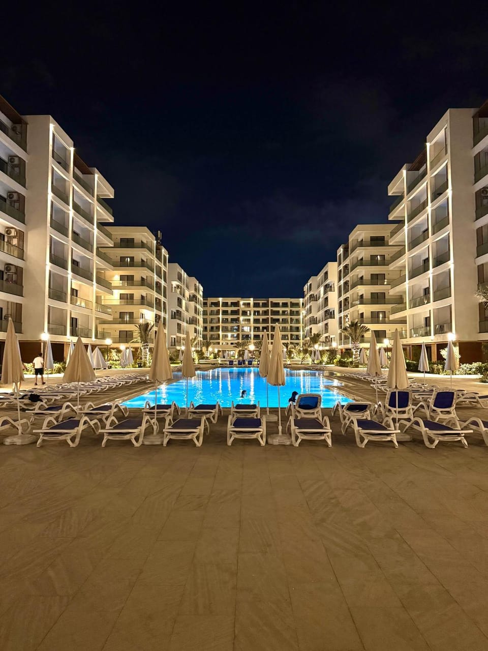 Property building, Night, Pool view, Swimming pool, sunbed