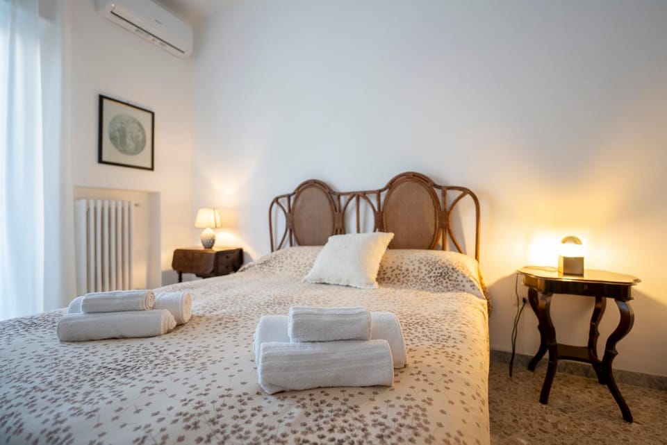 Bed, Photo of the whole room, Bedroom, towels, air conditioner