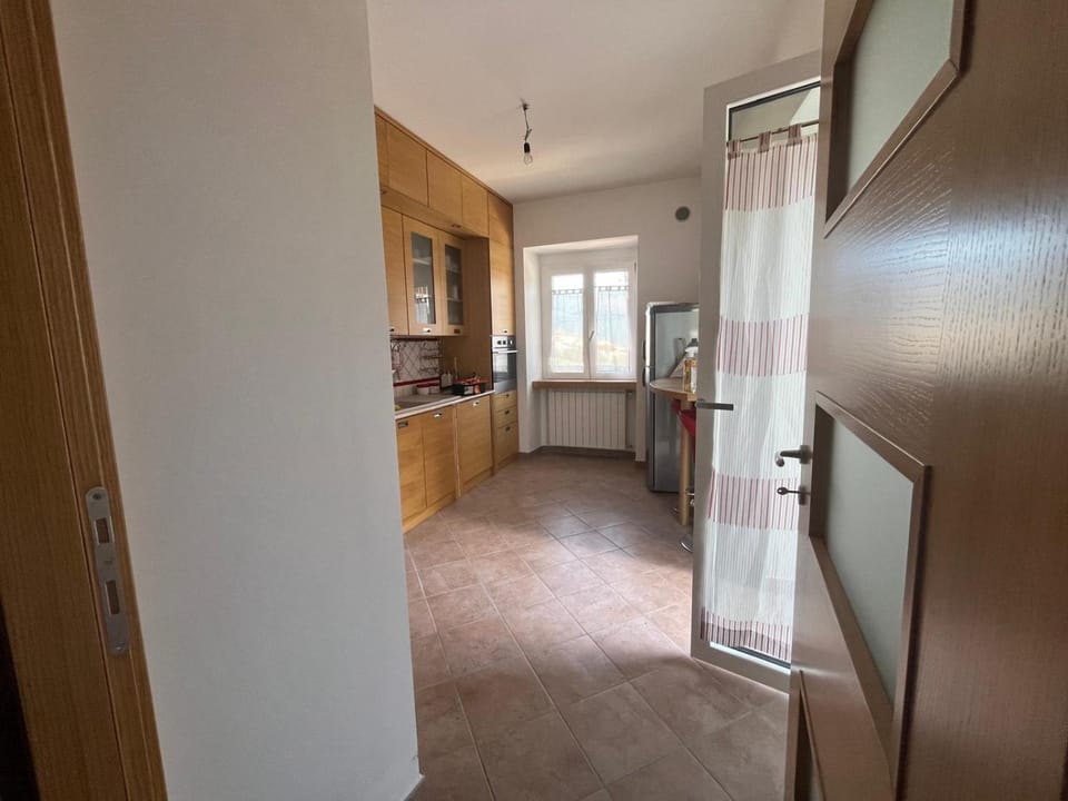 Kitchen or kitchenette, dishwasher, oven, stove