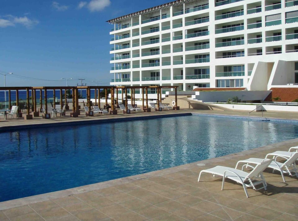 Palmar Condominium 1C - Ocean front - Garden level Apartment in State of Quintana Roo