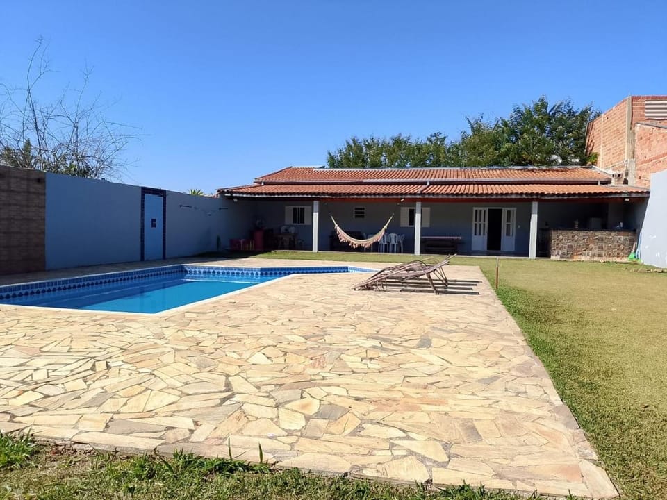 Property building, Pool view, Swimming pool, sunbed
