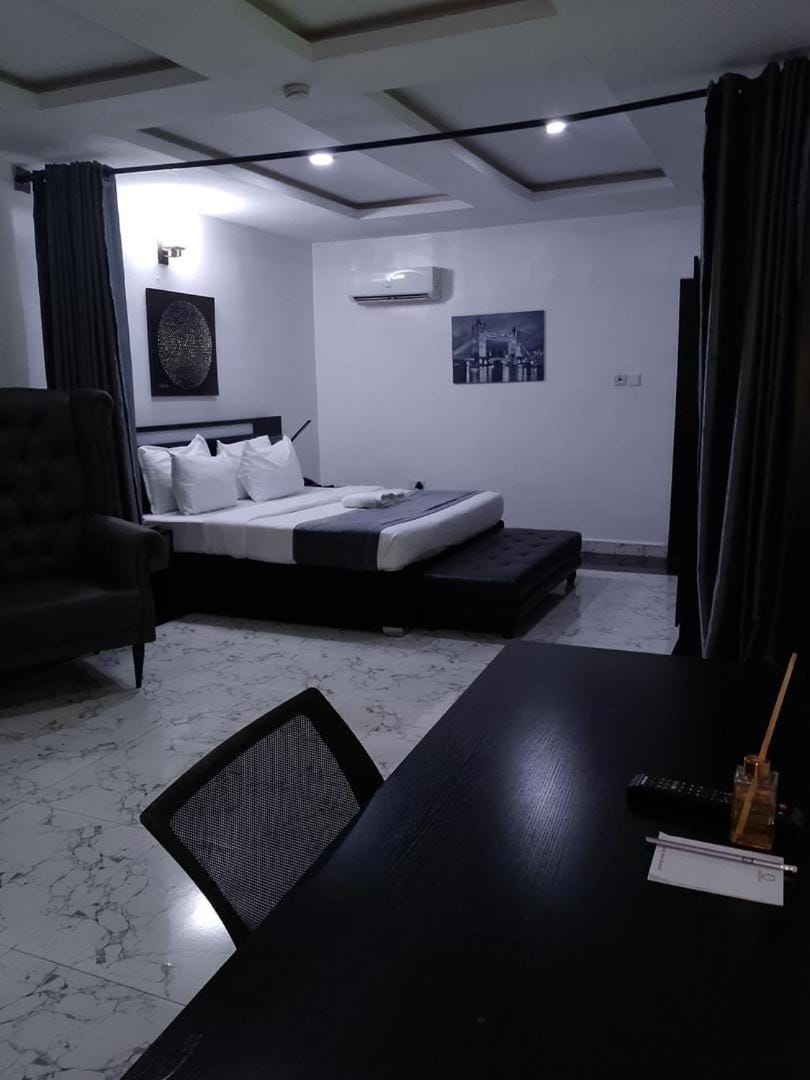 Bed, TV and multimedia, Seating area, Bedroom, air conditioner