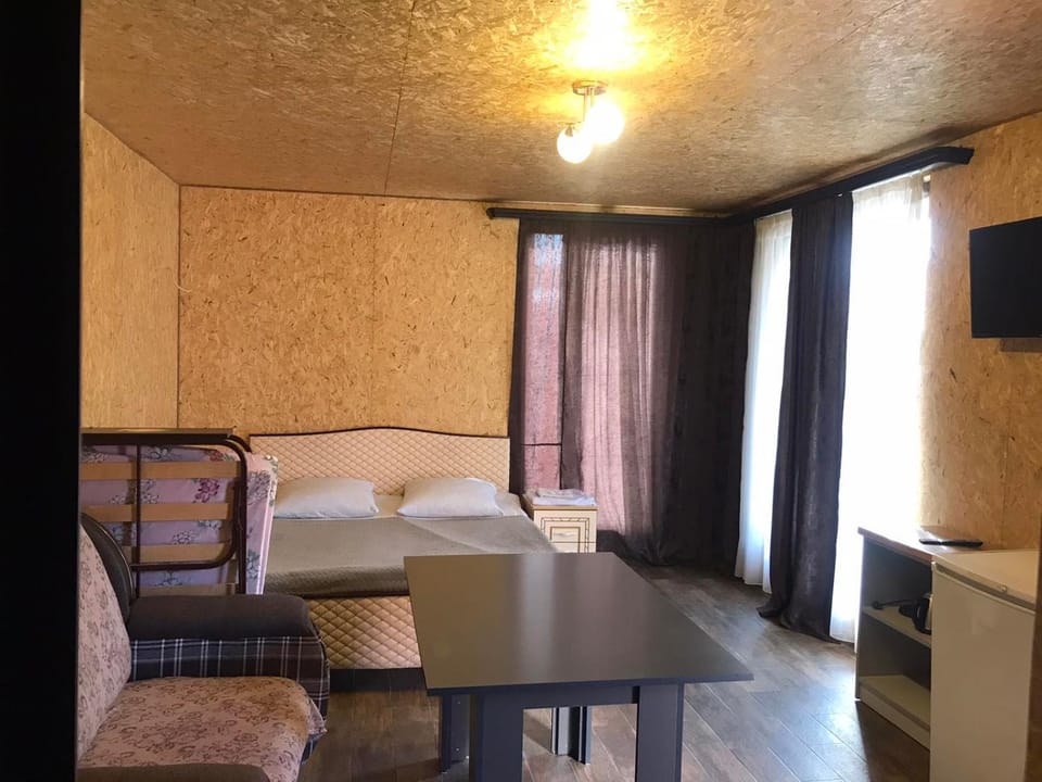 Bed, TV and multimedia, Seating area, Dining area, Bedroom, hair dresser