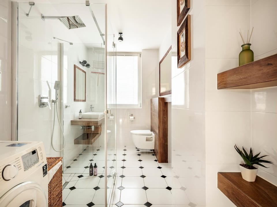 Shower, Toilet, Day, Bathroom, Decorative detail, hair dryier, washing machine