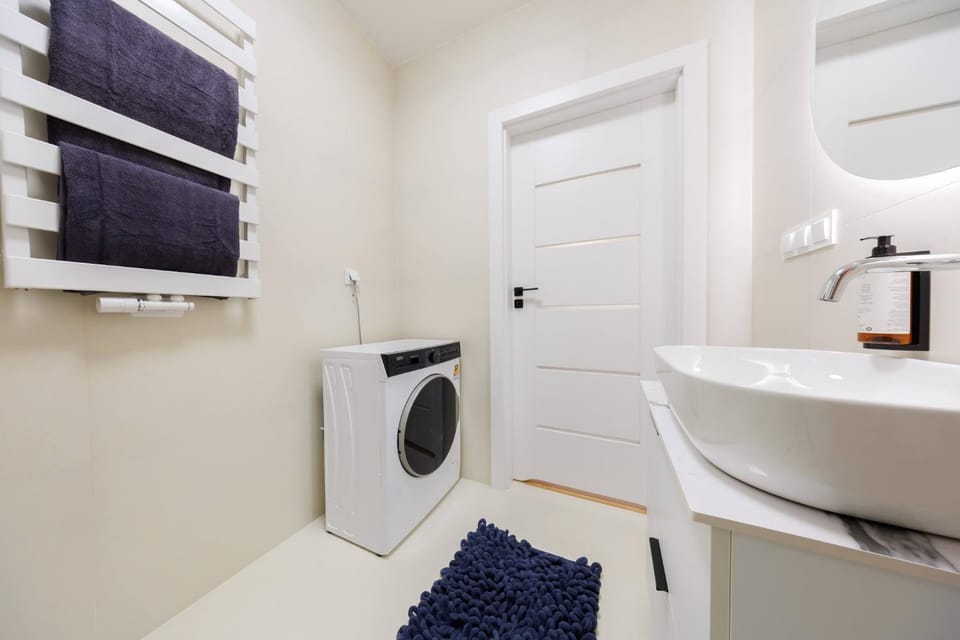 Bathroom, towels, washing machine, dryer