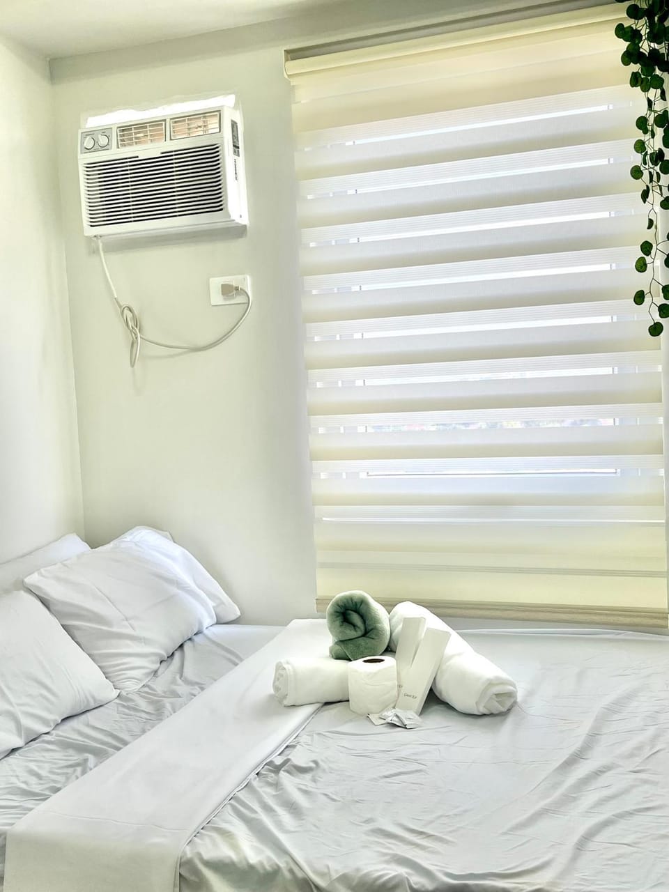 Bed, Photo of the whole room, Bedroom, towels, air conditioner