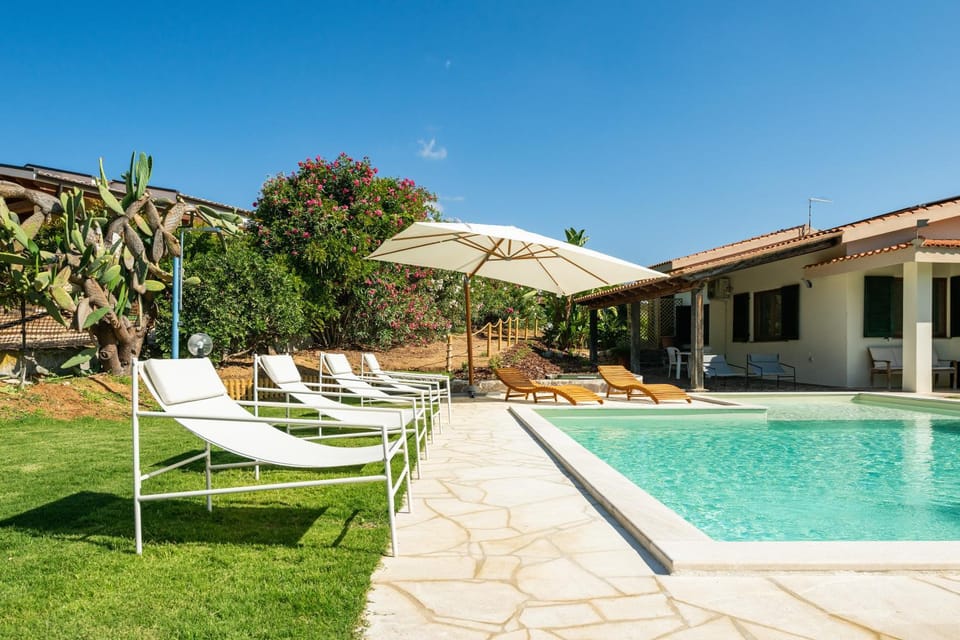 Property building, Living room, Swimming pool