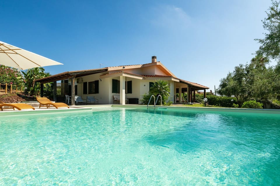 Property building, Living room, Swimming pool