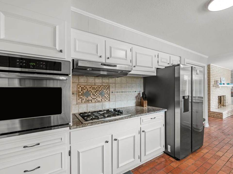 Kitchen or kitchenette, furniture, microwave, oven, stove, kitchen