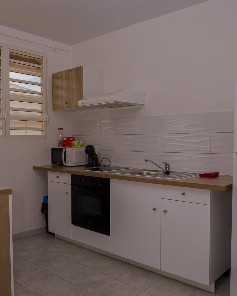 Kitchen or kitchenette, stove