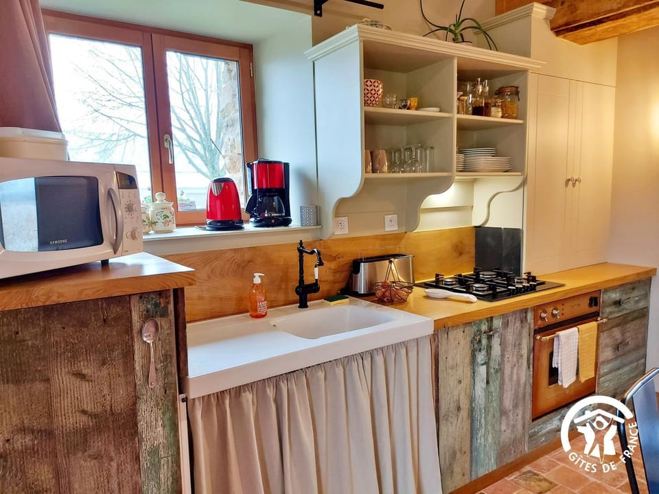Kitchen or kitchenette, oven, stove, toaster