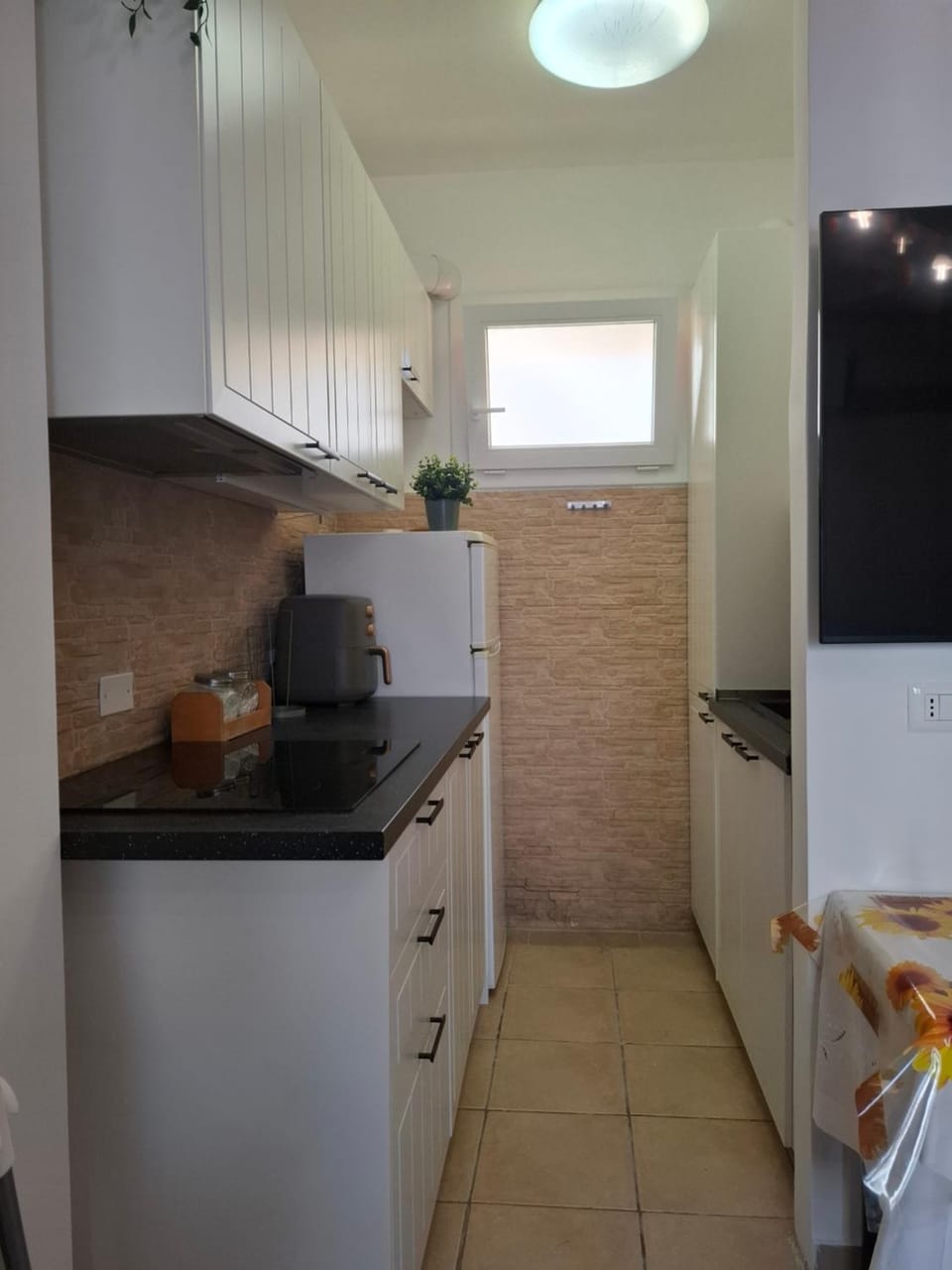 Kitchen or kitchenette, stove
