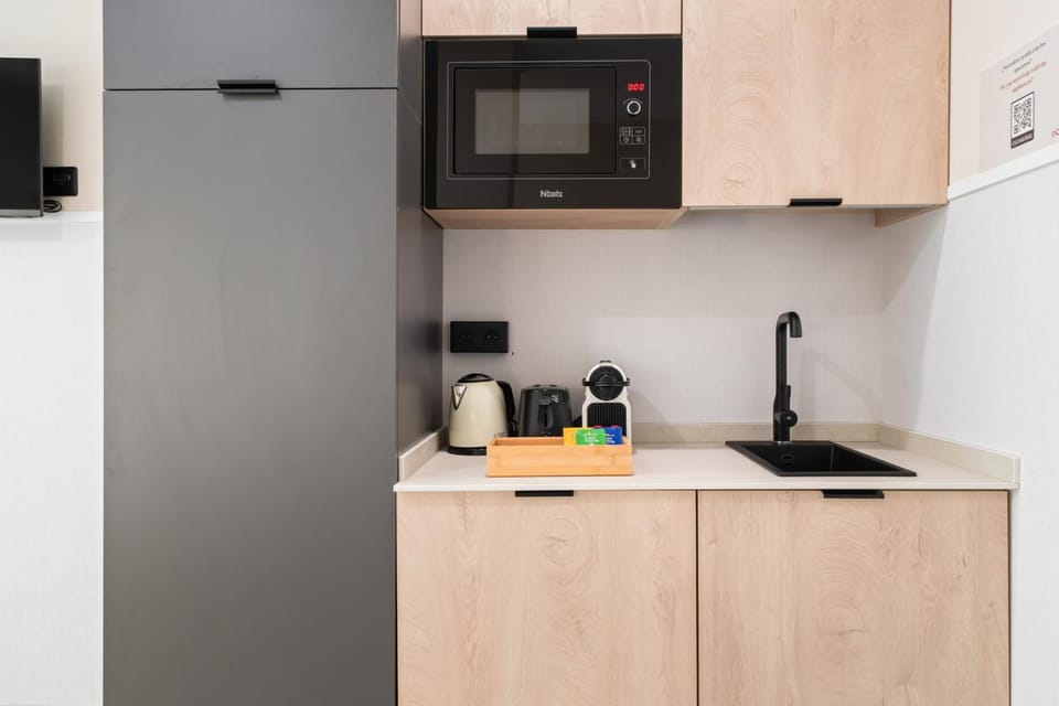 Kitchen or kitchenette, microwave