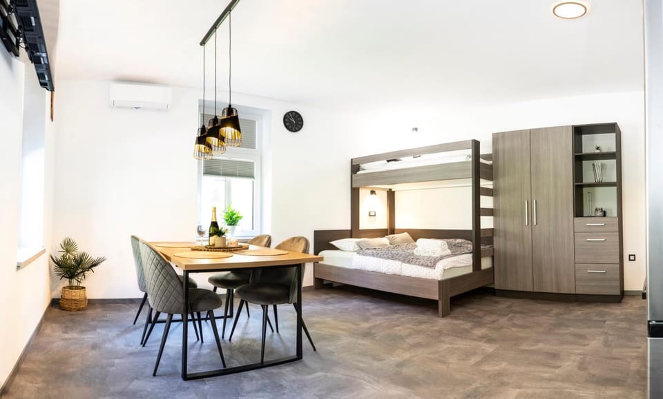 Bed, Living room, Dining area, Bedroom, towels, wardrobe, air conditioner