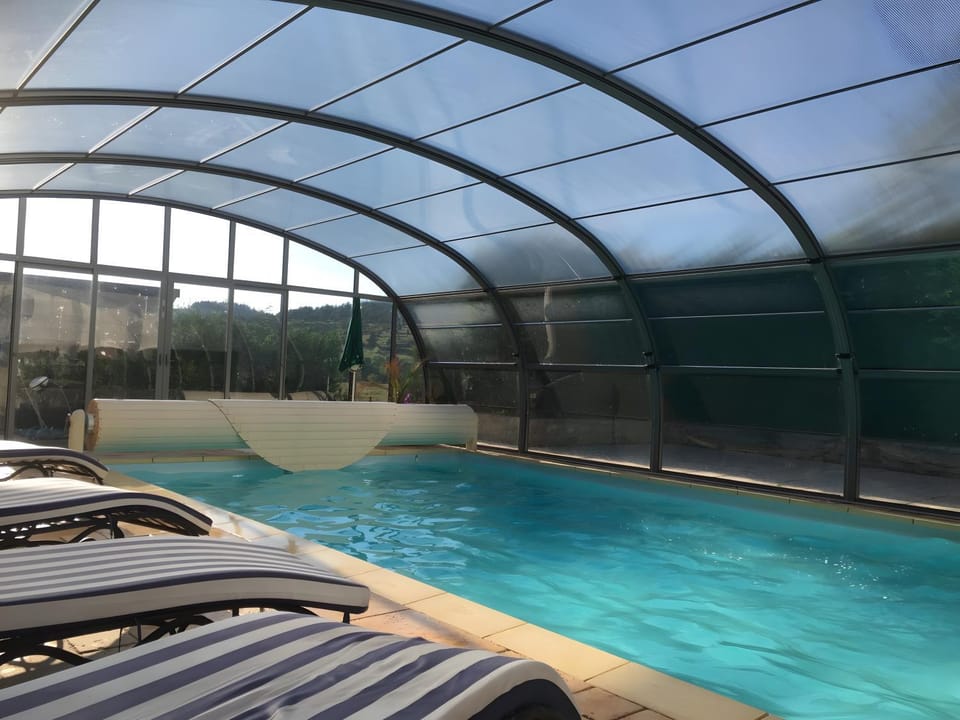 Property building, Living room, Swimming pool