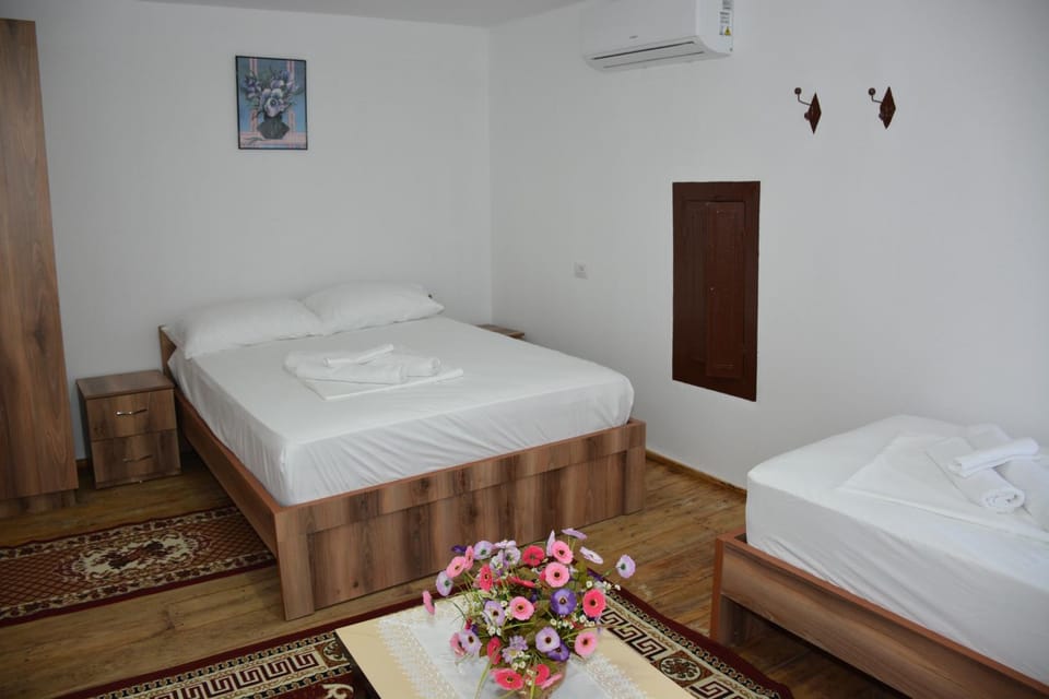 Bed, Photo of the whole room, Bedroom, towels, air conditioner