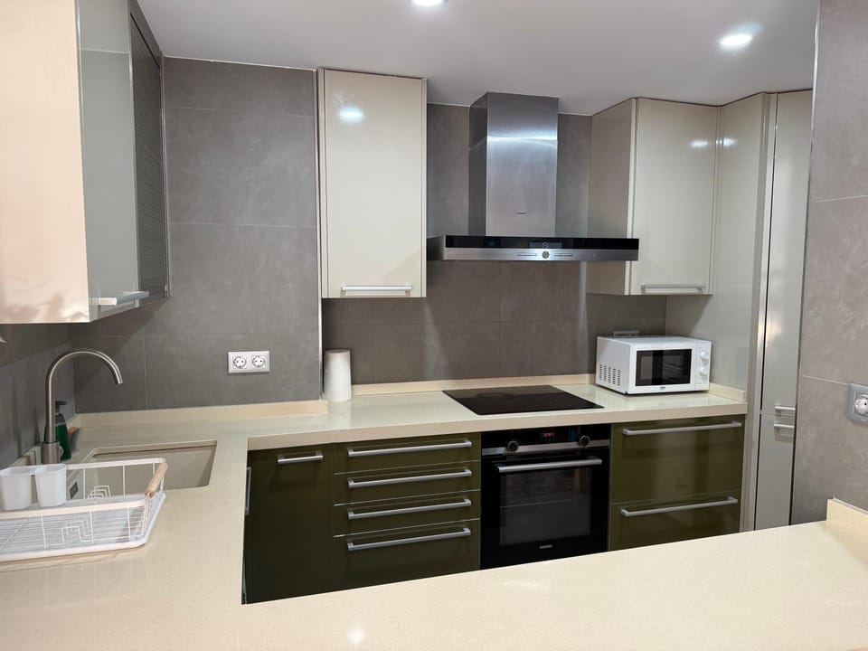 Kitchen or kitchenette, oven, stove, toaster