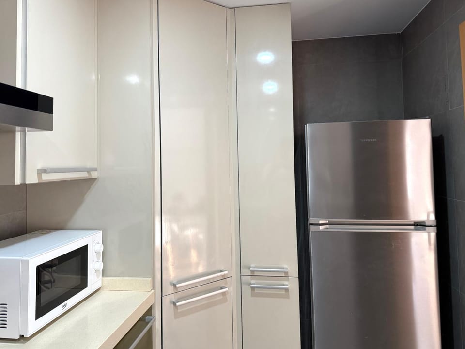 Kitchen or kitchenette, oven