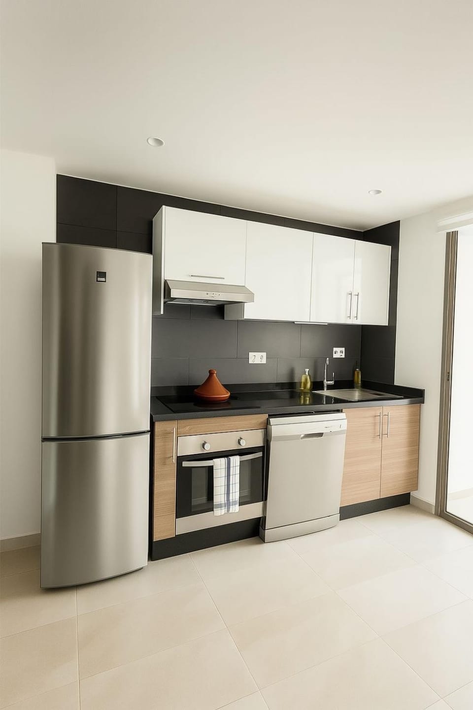 Kitchen or kitchenette, dishwasher, oven, stove, toaster