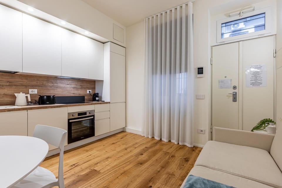 Kitchen or kitchenette, Living room, Seating area, Dining area, oven, stove, toaster