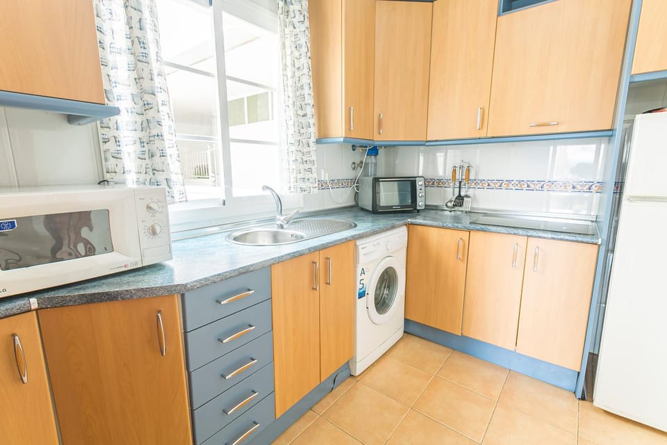microwave, oven, stove, washing machine, kitchen