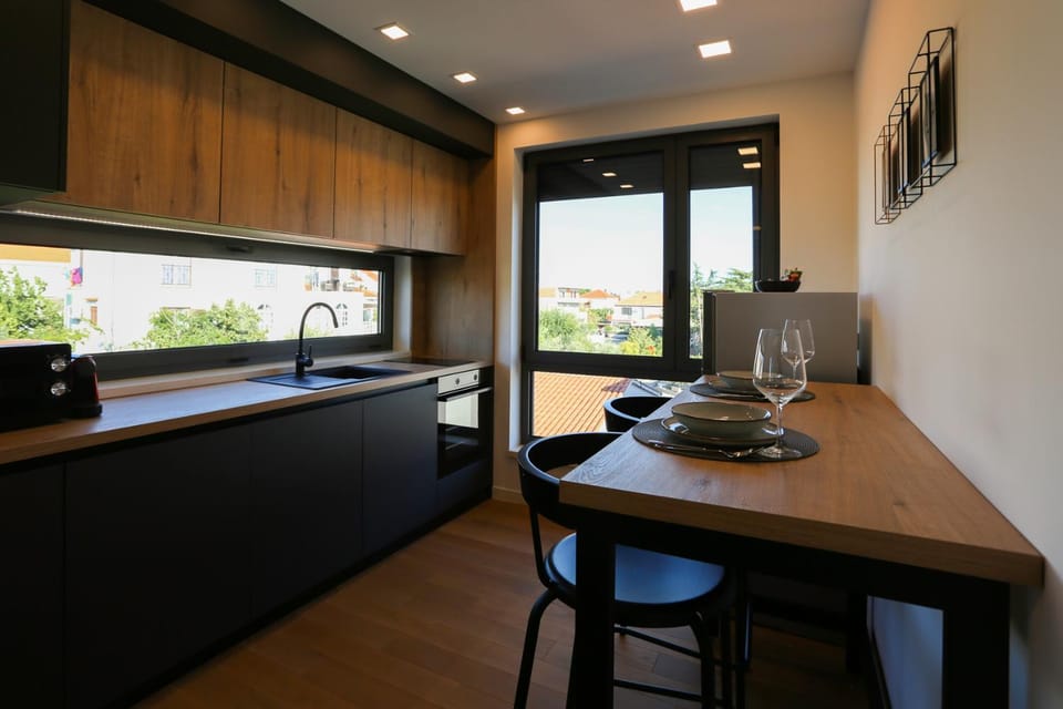 Dining area, dishwasher, oven, kitchen